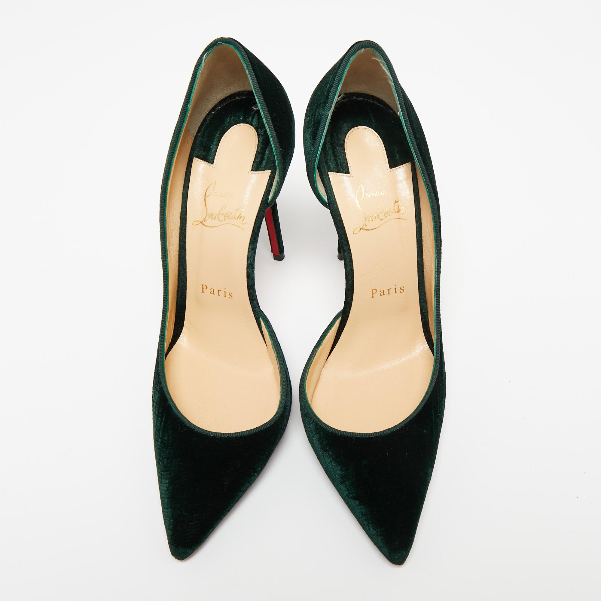Skilfully crafted from velvet in a D'orsay style with pointed toes, these Christian Louboutin pumps come ready to give you a high-fashion experience. The rich green pumps, with sharp-cut toplines, are balanced on 11 cm heels and finished with