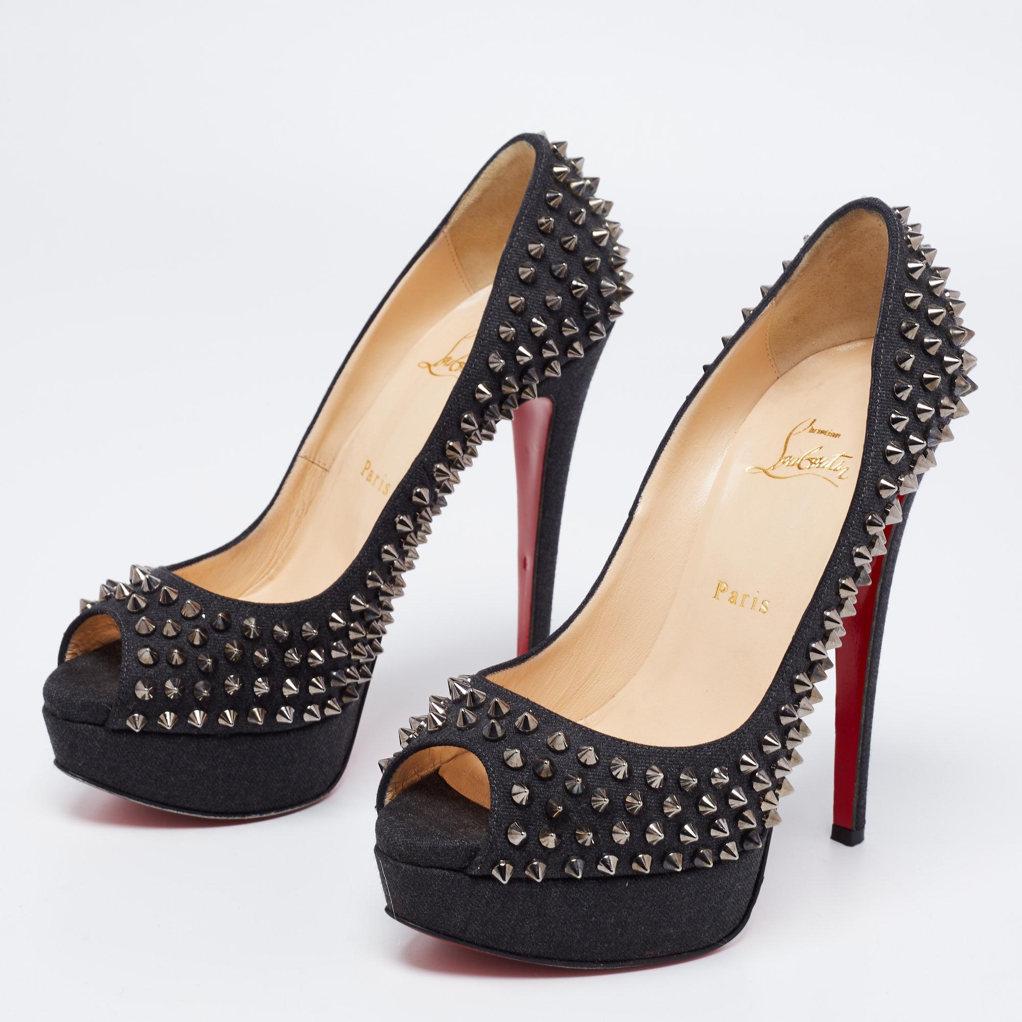 Stand out from the crowd with this classy pair of Christian Louboutin pumps that exude high fashion with class. Crafted from denim, this is a creation from their Lady Peep collection, and the addition of spikes lends it a bold twist. Complete with
