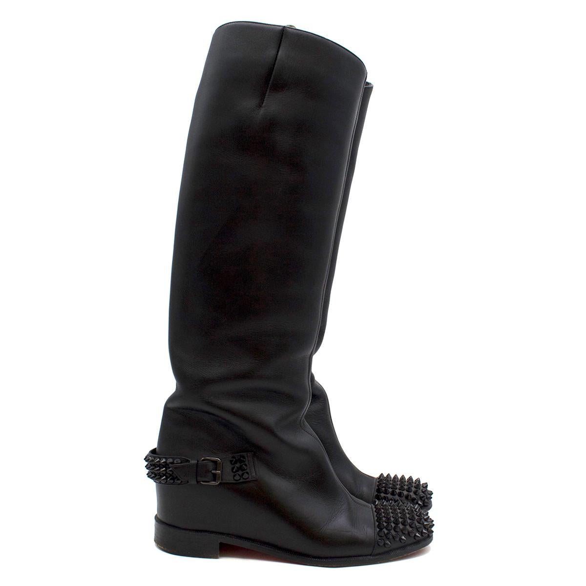 Christian Louboutin Egoutina studded leather boots

- Black leather boots
- Knee length
- Round toe
- Stud embellishing to the toe and heel
- Pull on

Please note, these items are pre-owned and may show some signs of storage, even when unworn and