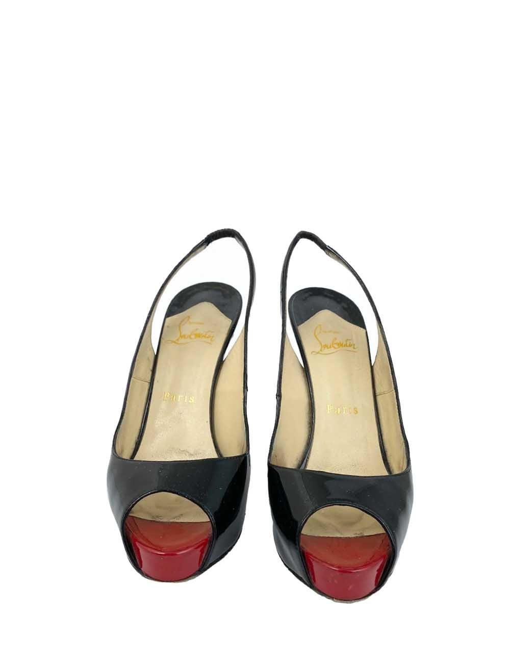 Christian Louboutin Black patent leather peep toe pumps, with red soles.
Additional information:
Material: Leather
Size: EU 37.5
Heel Length: 12 cm
Overall Condition: Good
Interior Condition: color change.
Exterior Condition: Leather scratches and