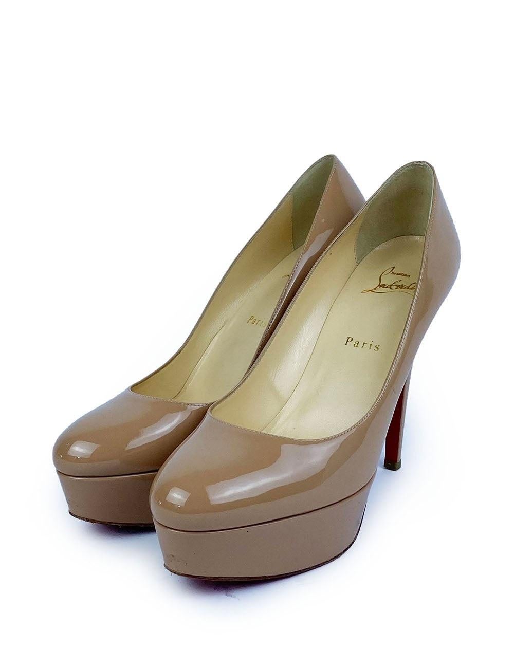Christian Louboutin Nude Patent Leather Bianca Platform Pumps.

Additional information:
Material: Leather,
Size: EU 39.5
Measurements:
Heel length: 12 cm
Overall Condition: Good
Interior Condition: signs of wear
Exterior Condition: leather