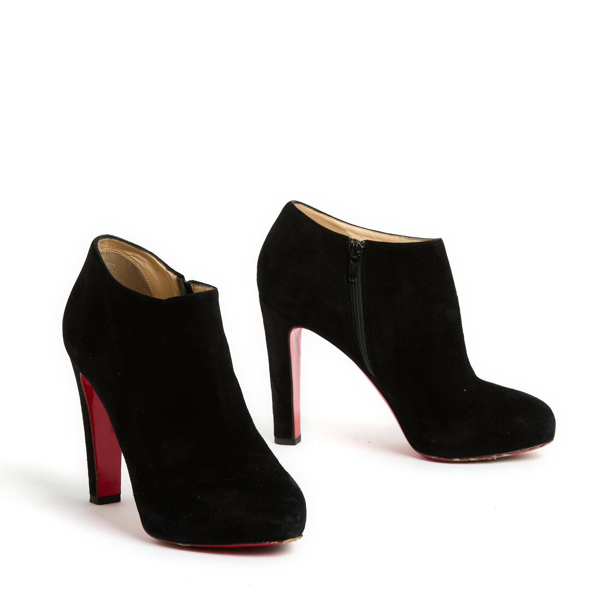 Christian Louboutin ankle boots in black suede, straight heel and small platform in front, almond toe. Size 39FR, i.e. UK5.5 and US7.5, heel 12 cm, front sole 2 cm, insole 25 cm. The boots have been worn but they are in perfect condition,