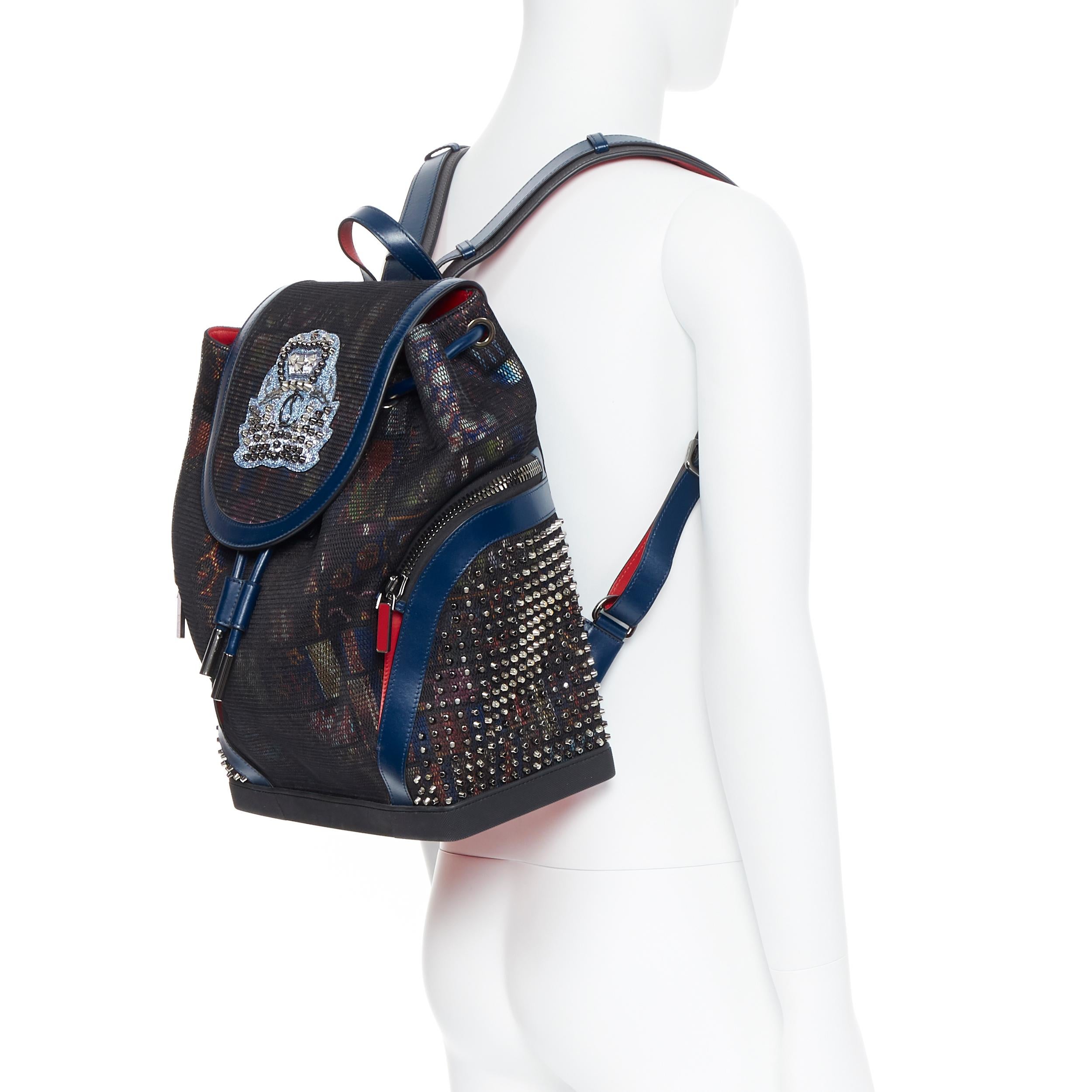CHRISTIAN LOUBOUTIN Explorafunk studded printed mesh leather trimmed backpack
Brand: Christian Louboutin
Designer: Christian Louboutin
Model Name / Style: Explorafunk
Material: Leather
Color: Navy
Pattern: Abstract
Closure: Zip
Extra Detail: