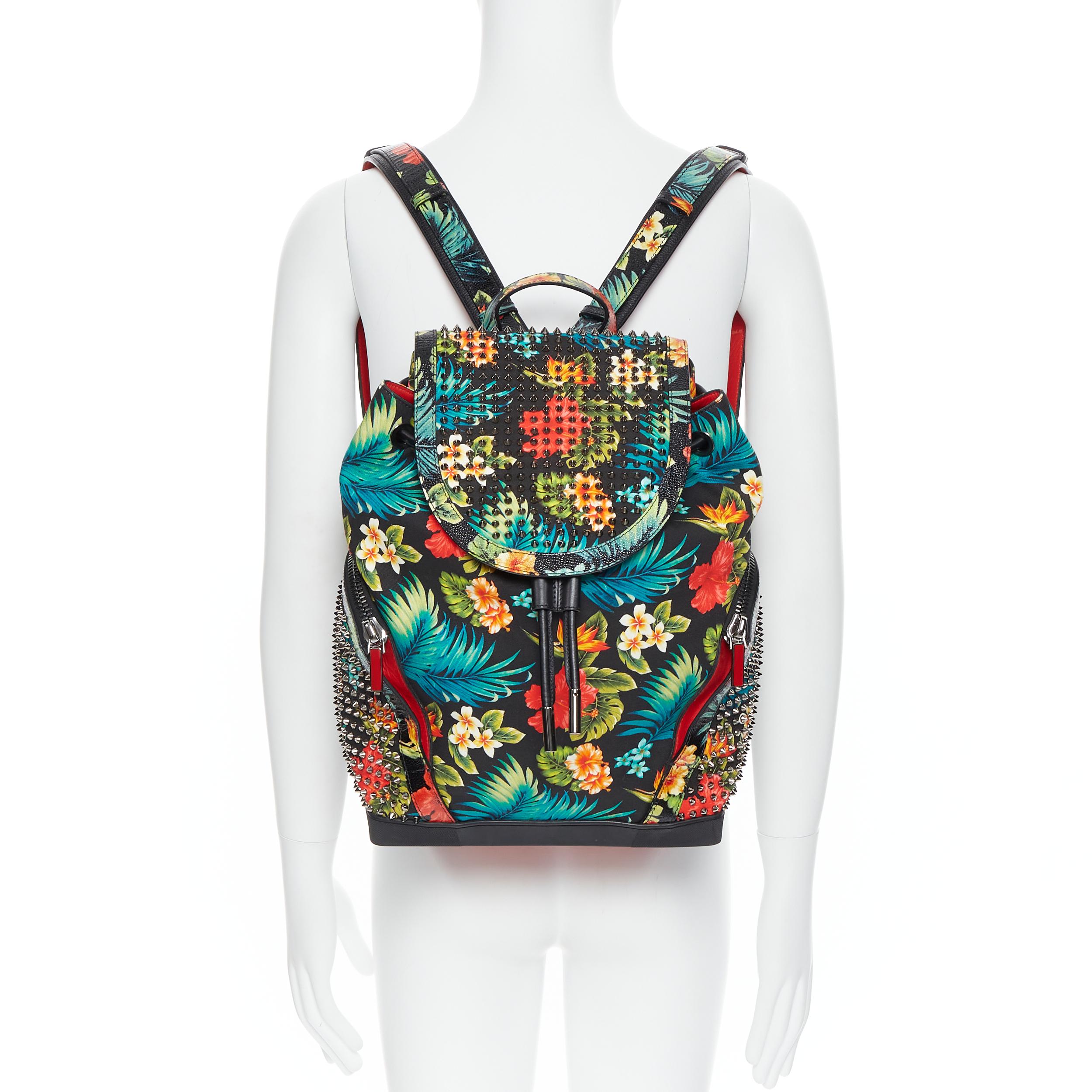 CHRISTIAN LOUBOUTIN Explorafunk tropical floral canvas spike stud backpack bag 
Reference: TGAS/B00740 
Brand: Christian Louboutin 
Designer: Christian Louboutin 
Model: Explorafunk backpack 
Material: Fabric 
Color: Green 
Pattern: Floral 
Closure: