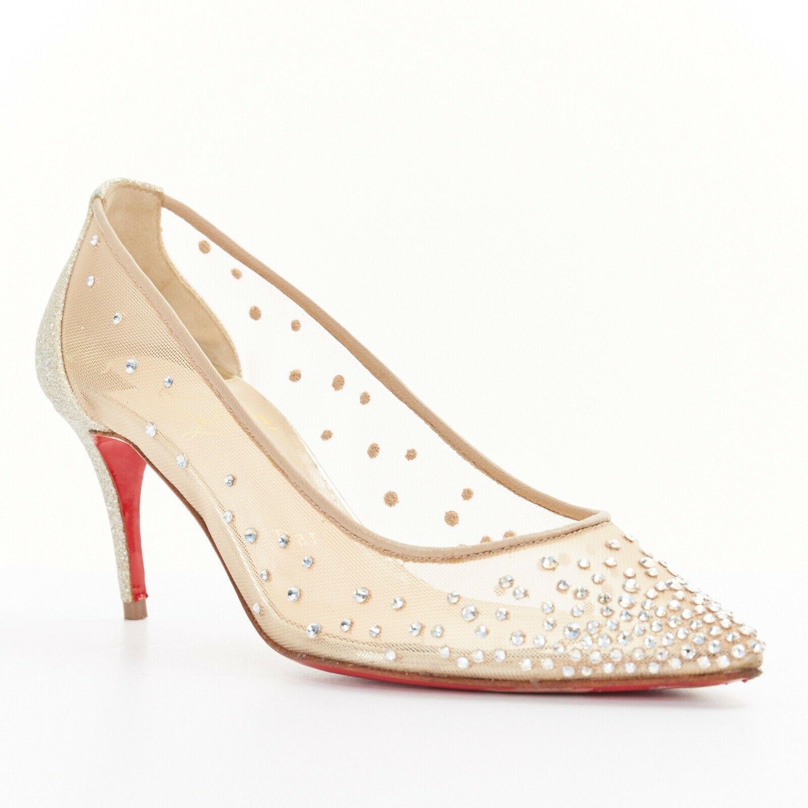 CHRISTIAN LOUBOUTIN Follies Strass 70 nude mesh crystal gold bridal heel EU34
CHRISTIAN LOUBOUTIN
Follies Strass 70. Fine gold glitter leather covered heel. 
Sheer nude mesh upper. 
Gradient strass crystal embellishment- each crystal is embellished