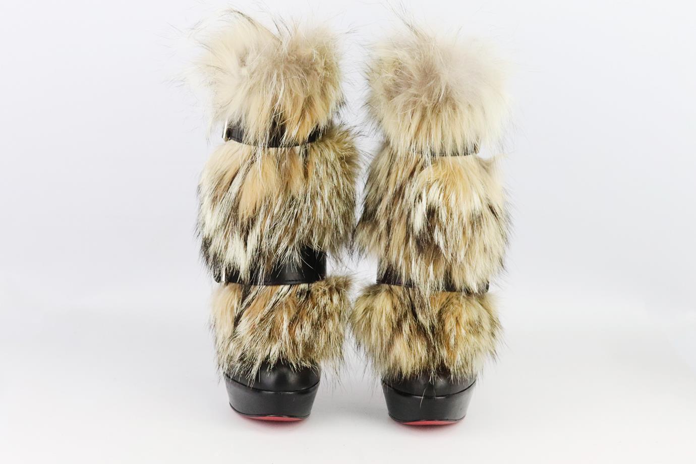 Christian Louboutin fur and leather platform ankle boots. Made from black leather with fur front and buckle detail and set on the brand’s iconic red sole. Black. Pull on. Does not come with box or dustbag. Size: EU 37.5 (UK 4.5, US 7.5). Outersole: