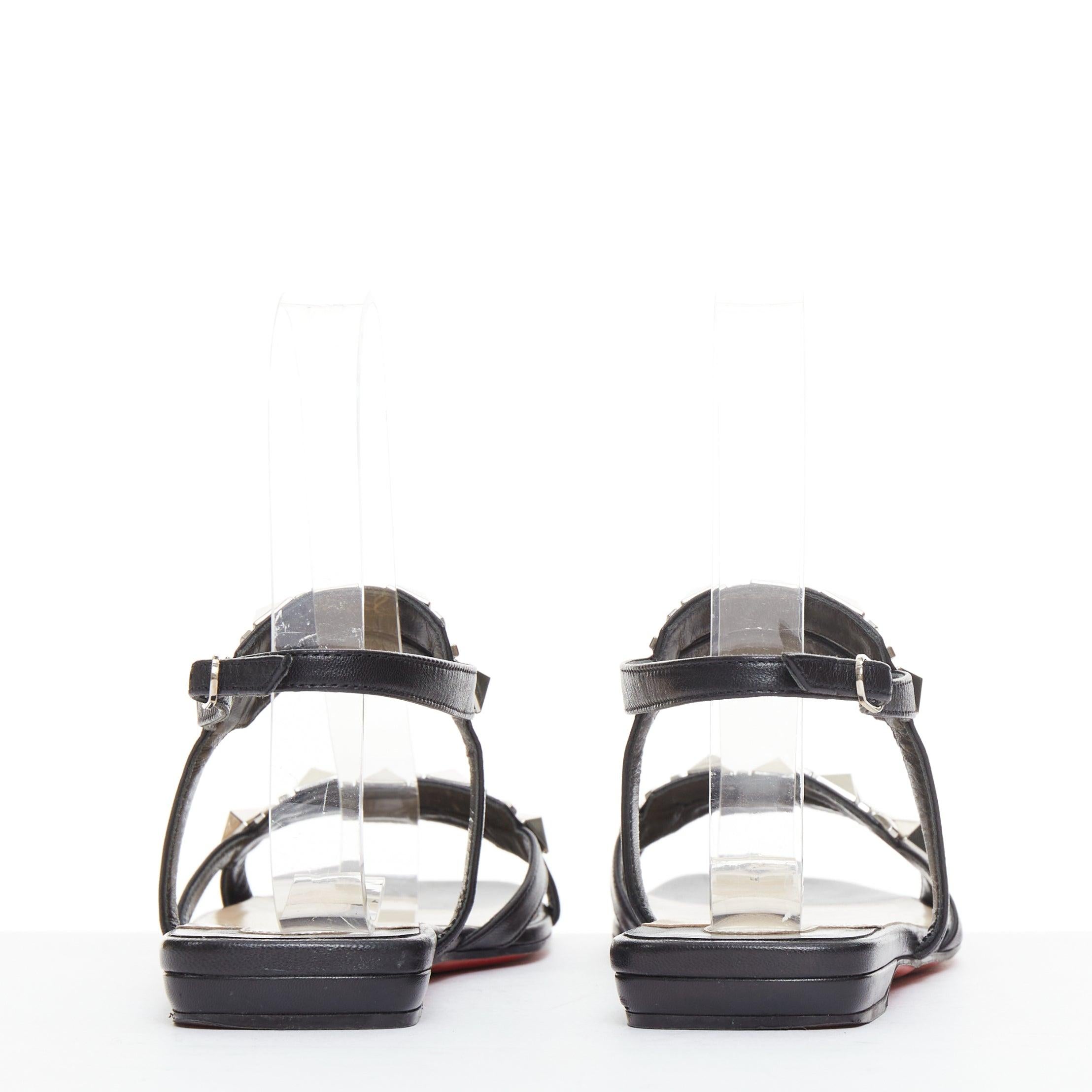 De las mujeres CHRISTIAN LOUBOUTIN Sandalias planas Galerietta de piel de becerro con tachuelas EU36.5 en venta