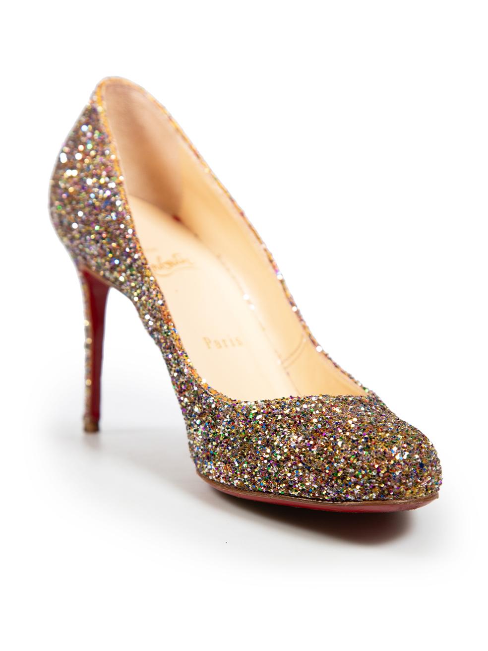 CONDITION is Good. Minor wear to the shoes is evident, there is discolouration on the insoles and some of the glitter has come off on the left heel. The right heel tip has a small split on this used Christian Louboutin designer resale item. This
