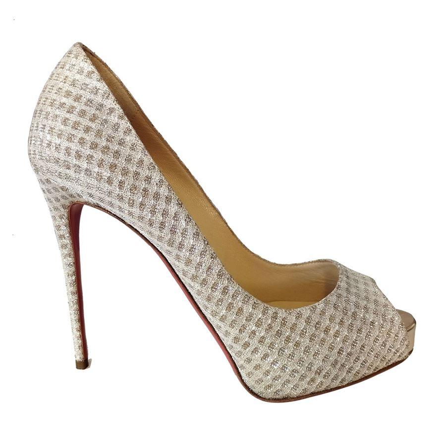 Leather covered by glittered textile Silver/gold color Heel height cm 12 (472 inches) Heel height cm 2 (078 inches)