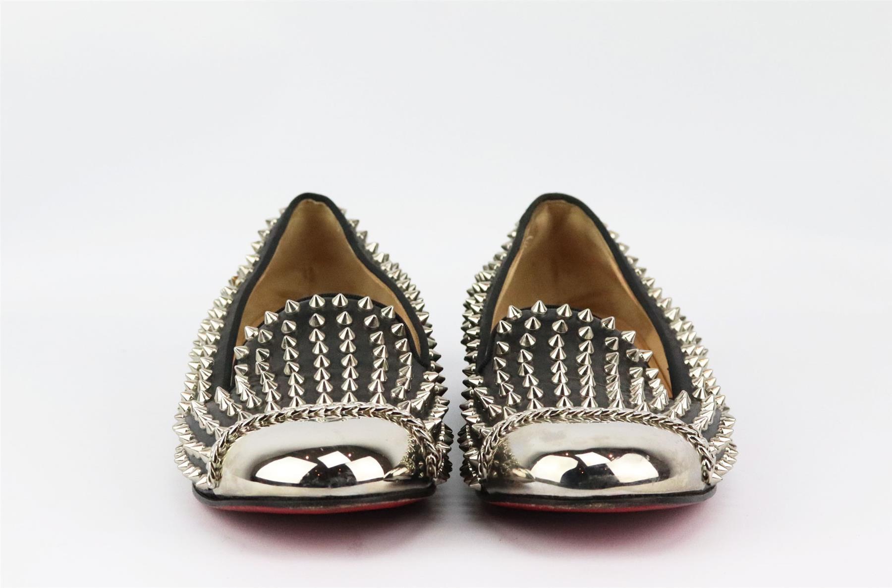 These loafers by Christian Louboutin are a glamorous approach to rock cool with spiked leather slippers which are a fresh update on the look, capped with silver metal, this tough-luxe pair will seal casual outfits with standout status. Heel measures