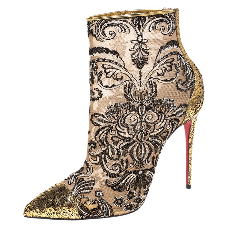 These boots are perfectly crafted from fabric, mesh and leather. They feature pointed toes, the signature red base and 11 cm heels. Upgrade your wardrobe basics with these stylish boots by Christian Louboutin.

Includes: The Luxury Closet Packaging

