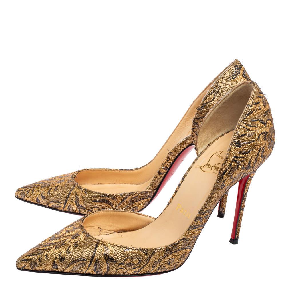 Skilfully crafted from brocade fabric in a D'orsay style with pointed toes, these Christian Louboutin pumps come ready to give you a high-fashion experience. The rich gold pumps, with sharp-cut toplines, are balanced on 10 cm heels and finished with