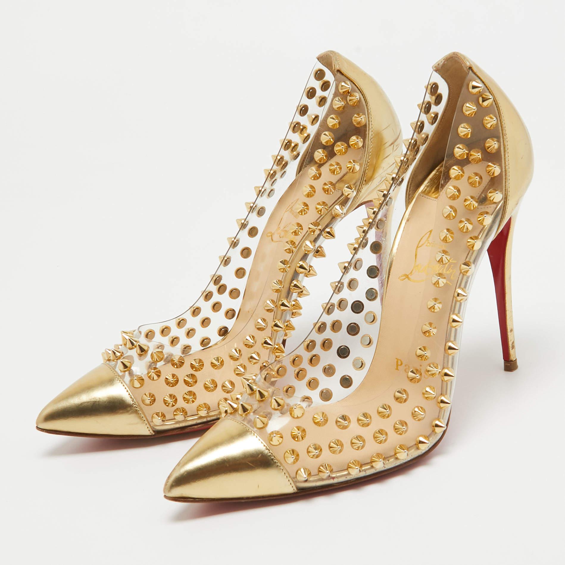 Crafted from PVC and leather these gold Spike Me pumps carry a mesmerizing shape with pointed toes and 10.5 cm heels. Adorned with the signature spike embellishments and complete with the iconic red soles this pair truly embodies the fine art of