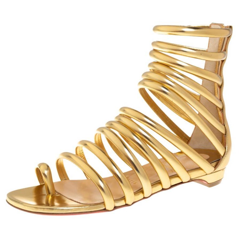 Christian Louboutin Gold Leather Catchetta Gladiator Flat Sandals Size 36  at 1stDibs | gold peep toe flat sandals, louboutin gladiator sandals, louboutin  sandals flat