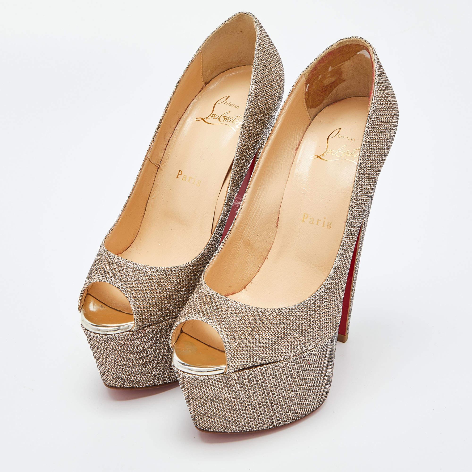 Strike a bold finish to your party outfit by wearing these stunning Christian Louboutin Highness pumps. Crafted with gold lurex fabric, they feature an impressive peep toe, high platforms, and tall heels.

Includes: Original Dustbag, Original Box,