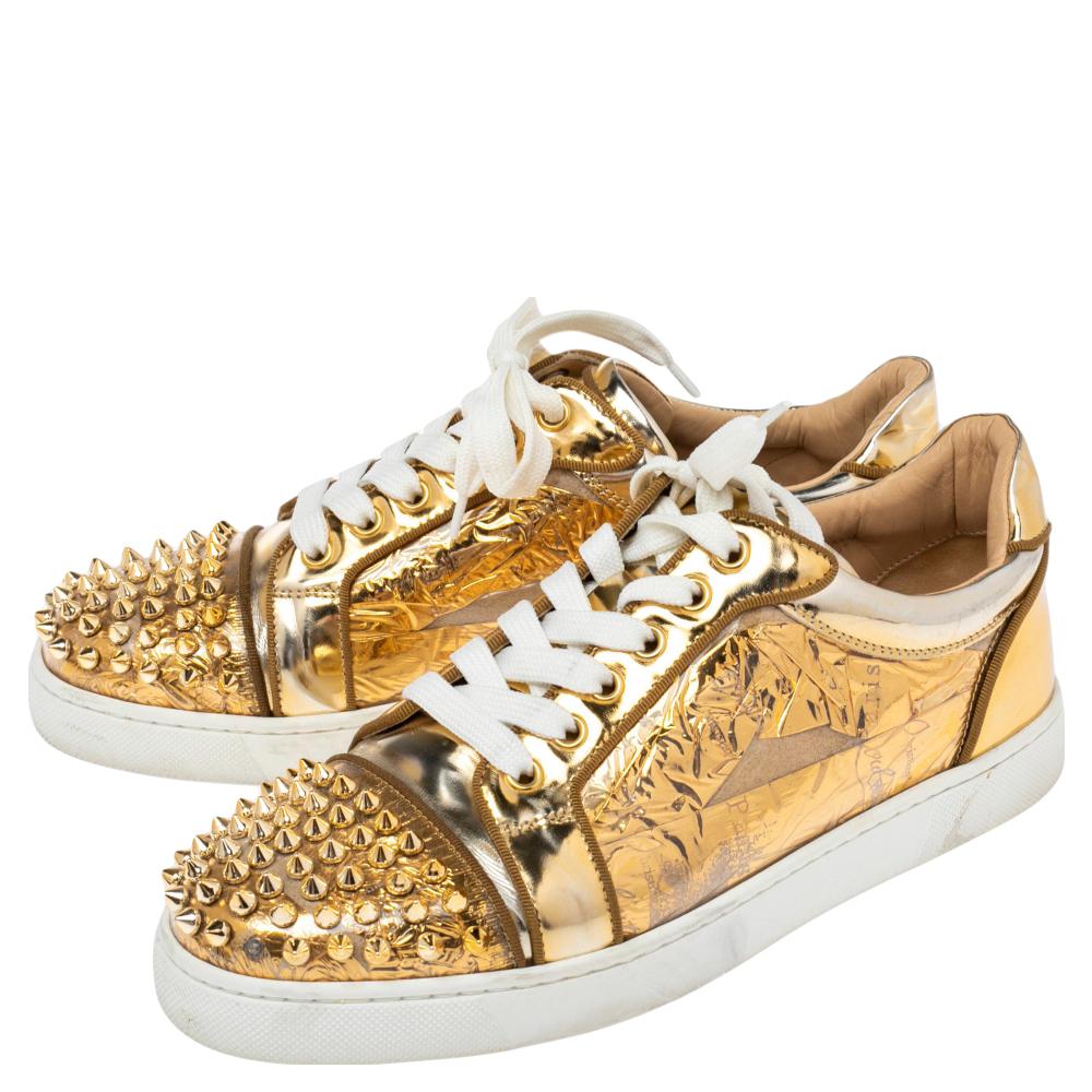 gold louboutin sneakers