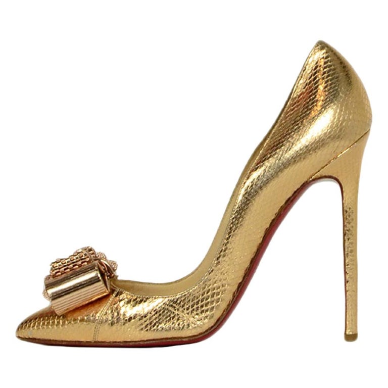 jug Illusion Erobre Christian Louboutin Gold Python Metal Nodo Bow Pigalle Pumps sz 38 RT. $2,  200 For Sale at 1stDibs | gold louboutins, gold louboutin heels, christian louboutin  gold heels