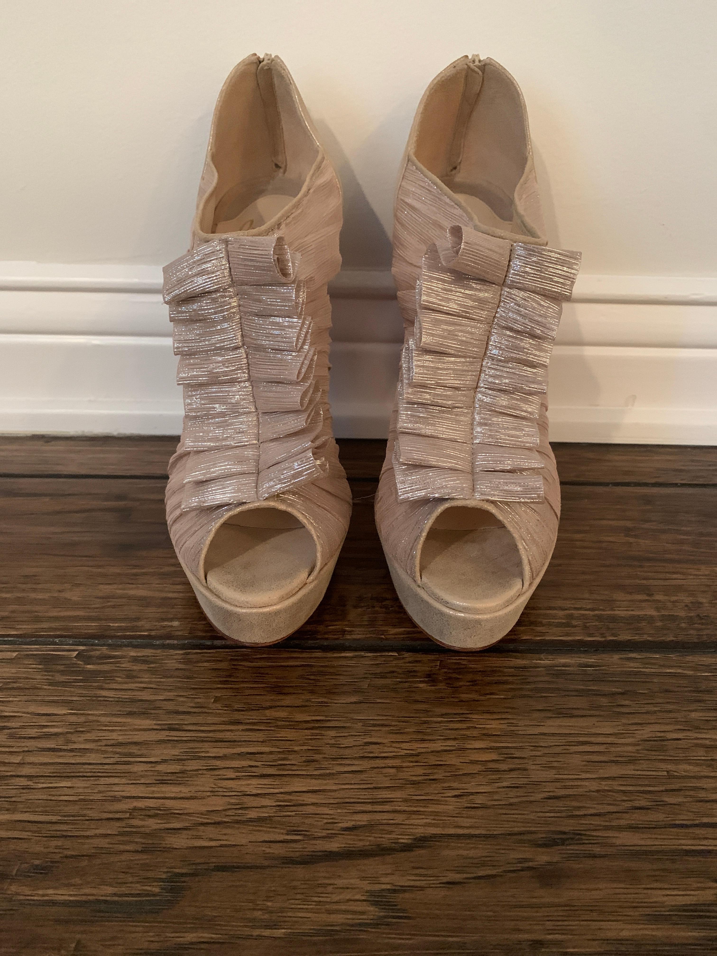Christian Louboutin Gold, Silk, Ruffle Stiletto Heels
Never Been Worn.
No Signs of wear on the soles
Heel Height 4.75inches 
Size 40 
Retail $1295
