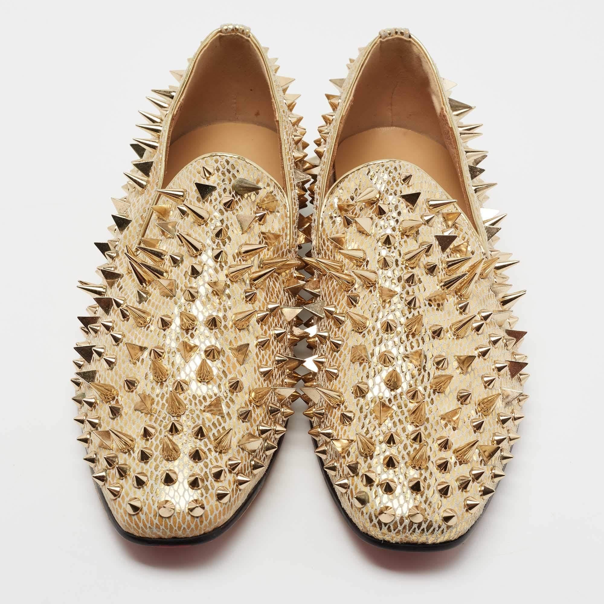 Add some edge to your look with this pair of Christian Louboutin loafers. Made from suede, their sophisticated and exotic look is coupled with spikes. Put these party shoes on!

Includes: Original Box

