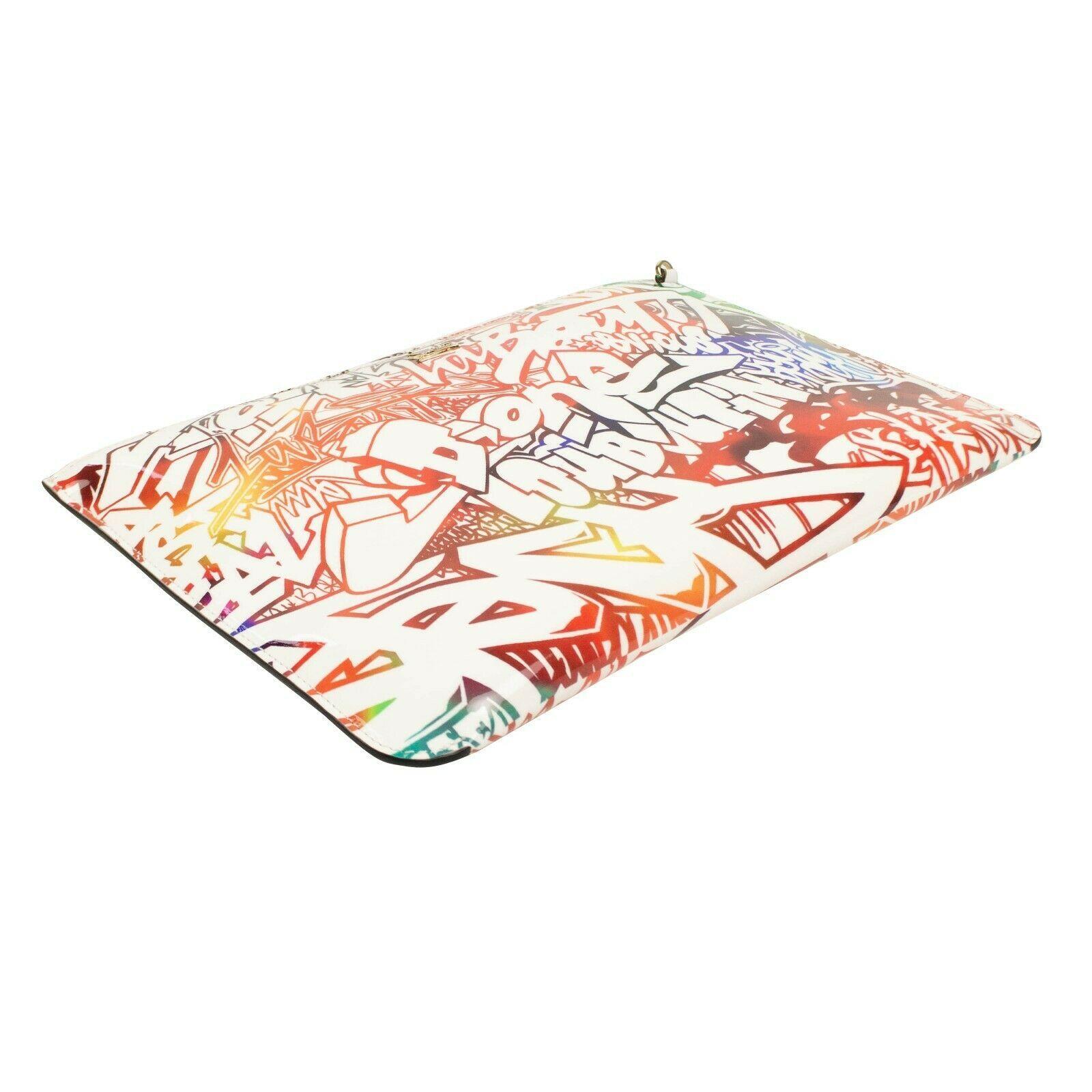 balenciaga graffiti clutch