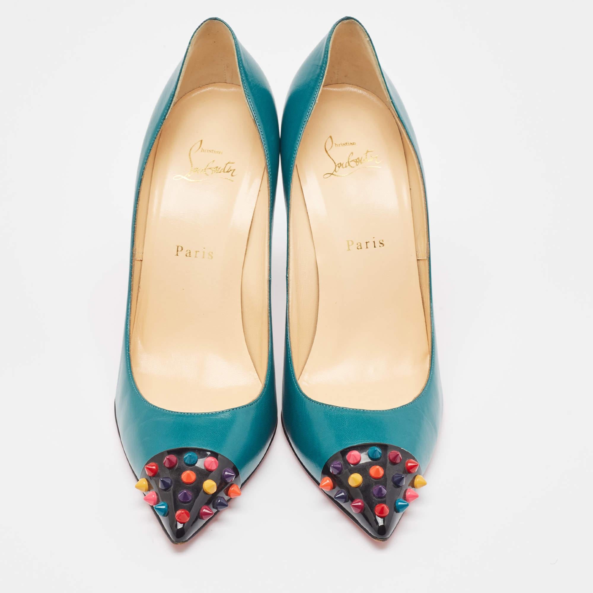 Be ready for praises and admirable gasps from your audience when you walk in these pumps from Christian Louboutin. Crafted from green leather, they carry pointed toes and spikes decorated on the cap toes. The pair is complete with 12cm heels, and