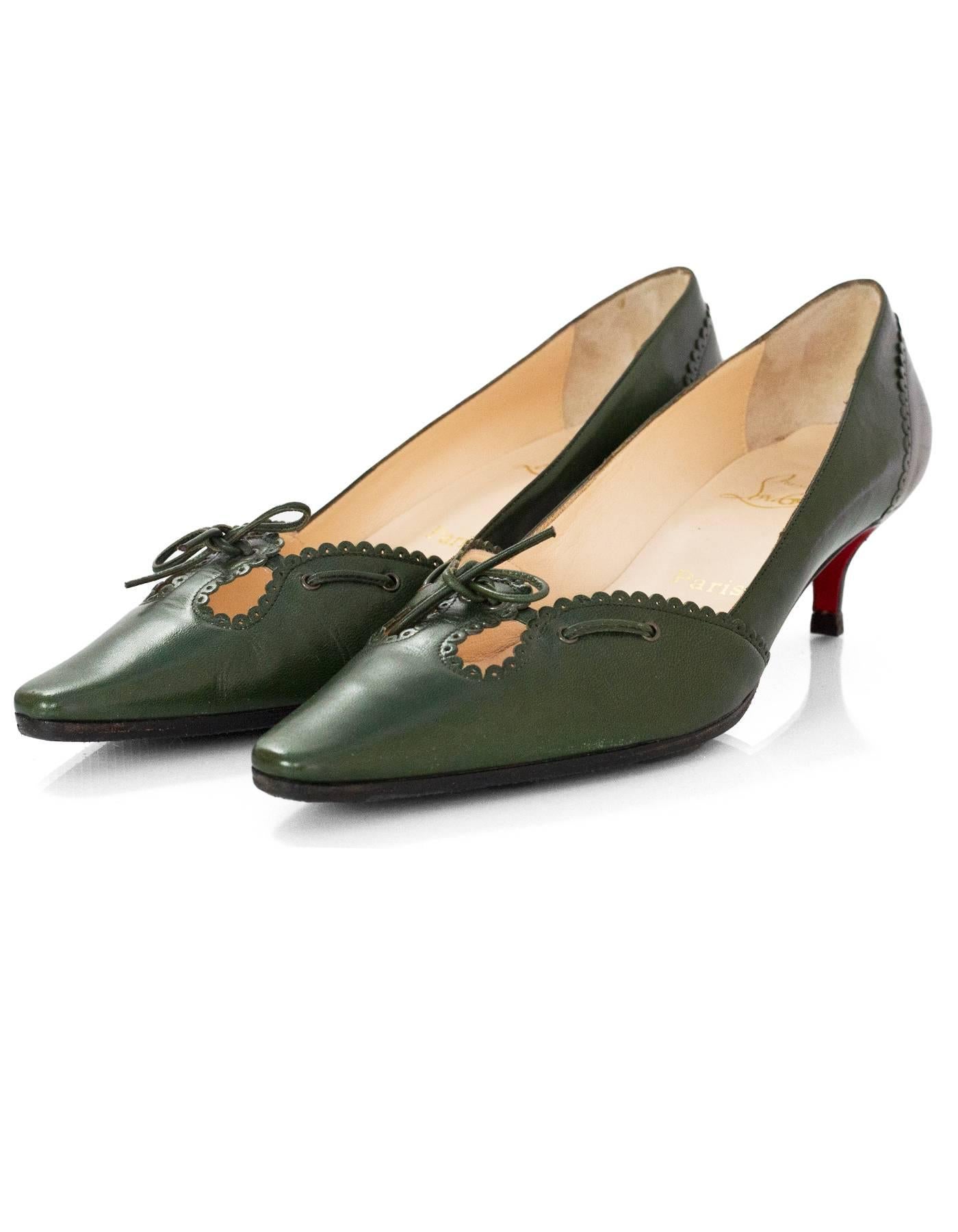 Christian Louboutin Green Leather Kitten Heels Sz 39.5

Made In: Italy
Color: Green
Materials: Leather
Closure/Opening: Slide on
Sole Stamp: Christian Louboutin vero cuoio made in Italy 39.5
Overall Condition: Excellent pre-owned condition with the