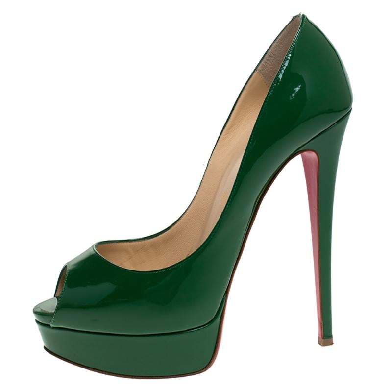 Stand out from a crowd with this gorgeous pair of Louboutins that exude high fashion with class! Crafted from patent leather, this is a creation from their Lady Peep collection. They feature a classic green shade with peep toes and a glossy