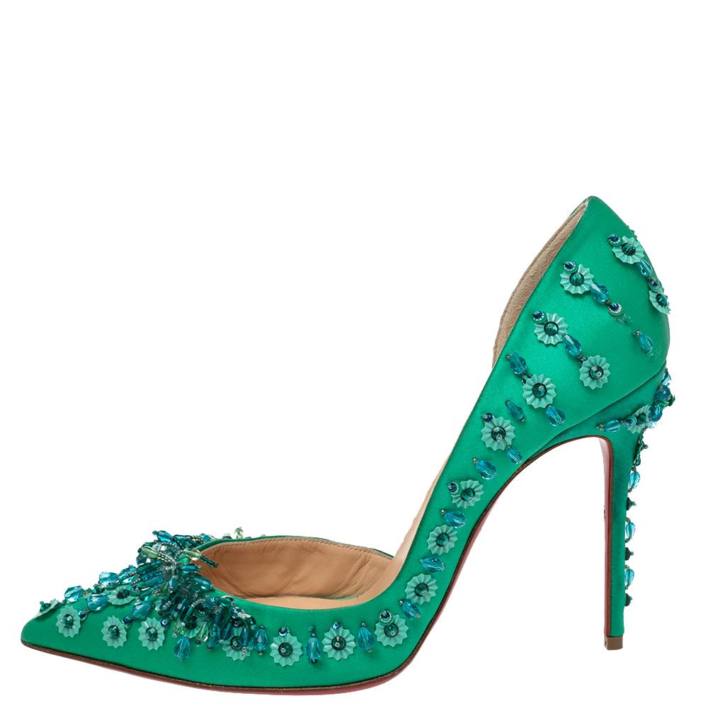 Skilfully crafted from embellished satin in a d'Orsay style with pointed toes, these Christian Louboutin pumps come ready to give you a high-fashion experience. The rich green pumps, with sharp-cut toplines, are balanced on 11 cm heels and finished