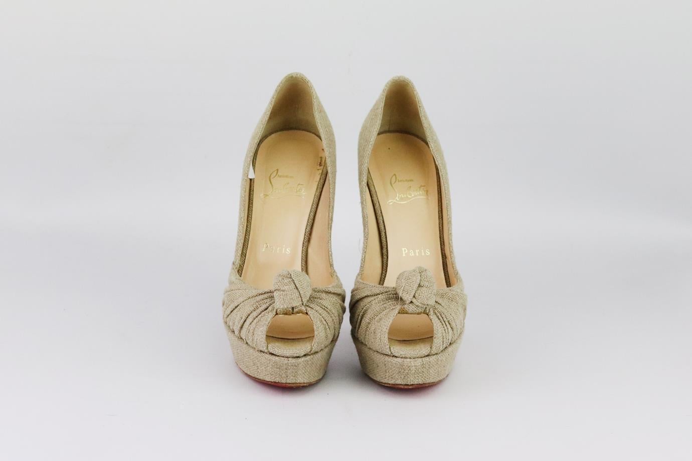 Christian Louboutin Greissimo jute platform pumps. Made from beige jute with twisted knot on the top, peep toe and set on the brand’s iconic red sole. Beige. Slips on. Does not come with box or dustbag. Size: EU 38 (UK 5, US 8). Insole: 9.4 in.