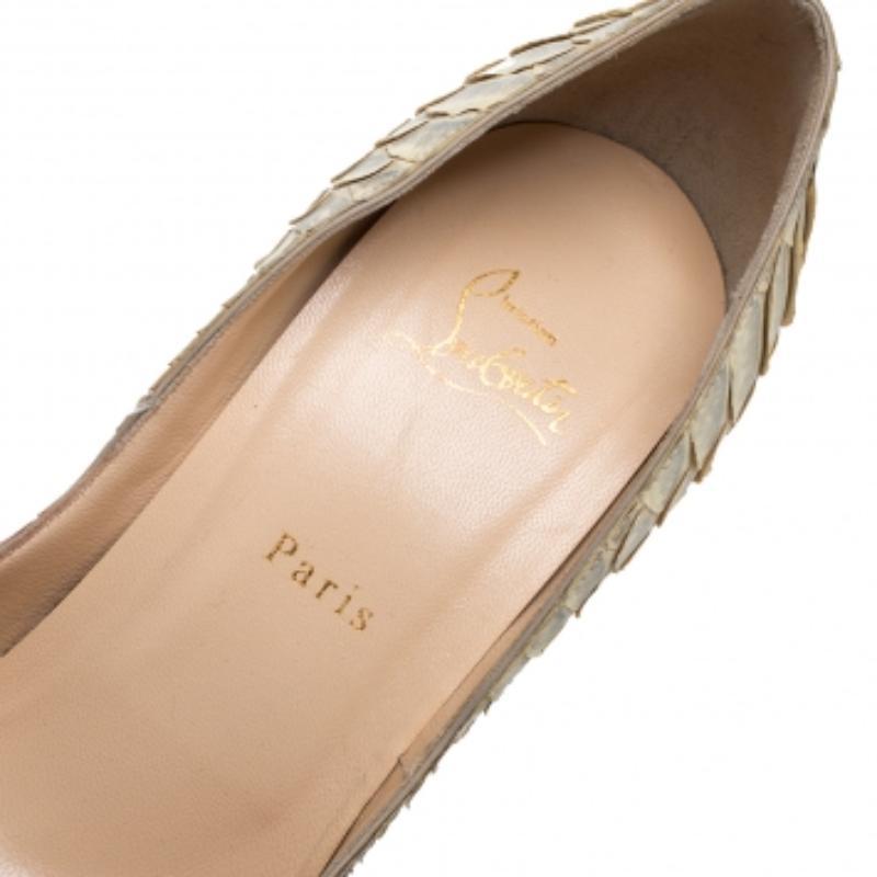 This gorgeous pair of Christian Louboutin Altadama peep-toe pumps will take a special place in your collection. Constructed in python leather, these pumps are set on sturdy platforms, sky-high heels, and signature red soles. NOTE: AVAILABLE FOR UAE