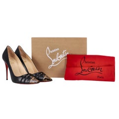 Christian Louboutin Heels With A Leopard Print Patent Leather Toe