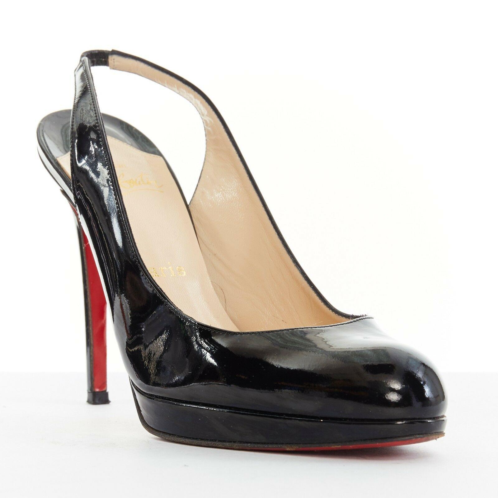 CHRISTIAN LOUBOUTIN Horatio 120 black patent round platform sling heel EU39 US9

CHRISTIAN LOUBOUTIN
Horatio 120. Black patent leather. Rounded almond toe. Platform front. Slim heel. Elasticated slingback. Tan leather lining. Lighly padded insole.