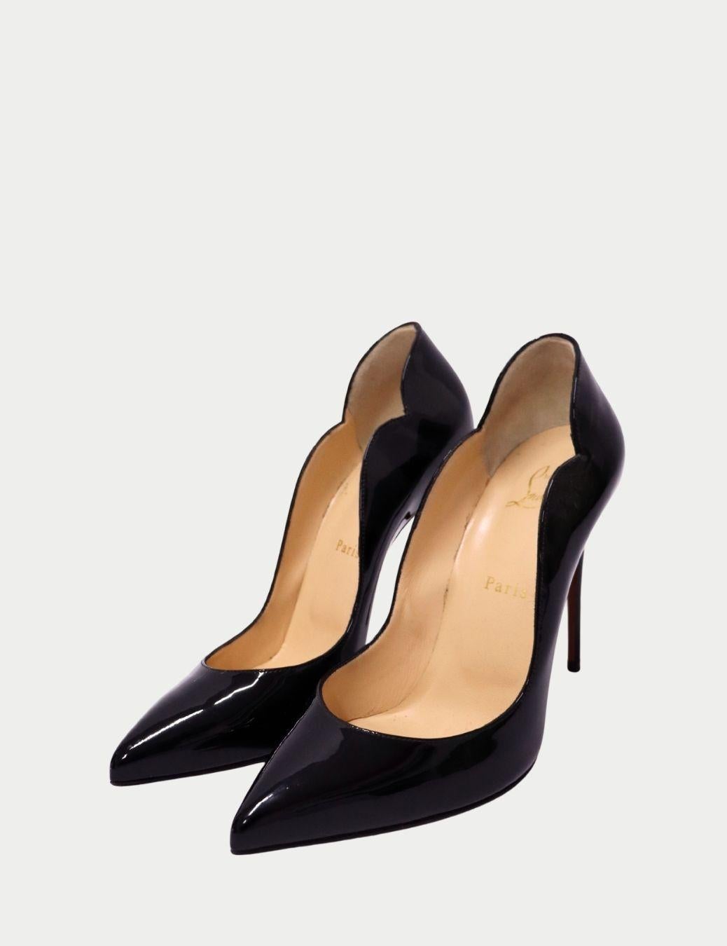 Christian Louboutin Hot Chick 100 mm pump in black patent leather

Add instant sophistication to any look with these striking Christian Louboutin black patent leather pumps, featuring the brand’s iconic wavy scalloped cut and sleek pointed toe.