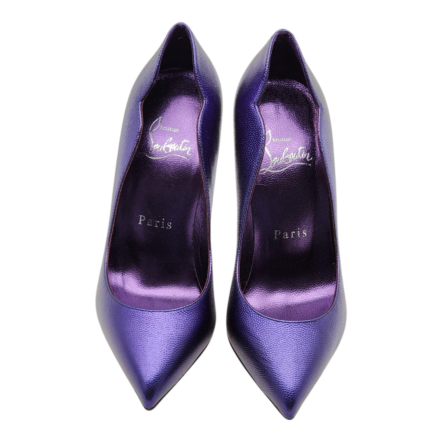 Christian Louboutin Hot Chick Pumps in purple leather. 

Notes from Louboutin: The Hot Chick pump is an iconic Maison Christian Louboutin design with a low-cut vamp, a pointed toe and V-shaped notches under the ankle. Set on a 100 mm heel, the