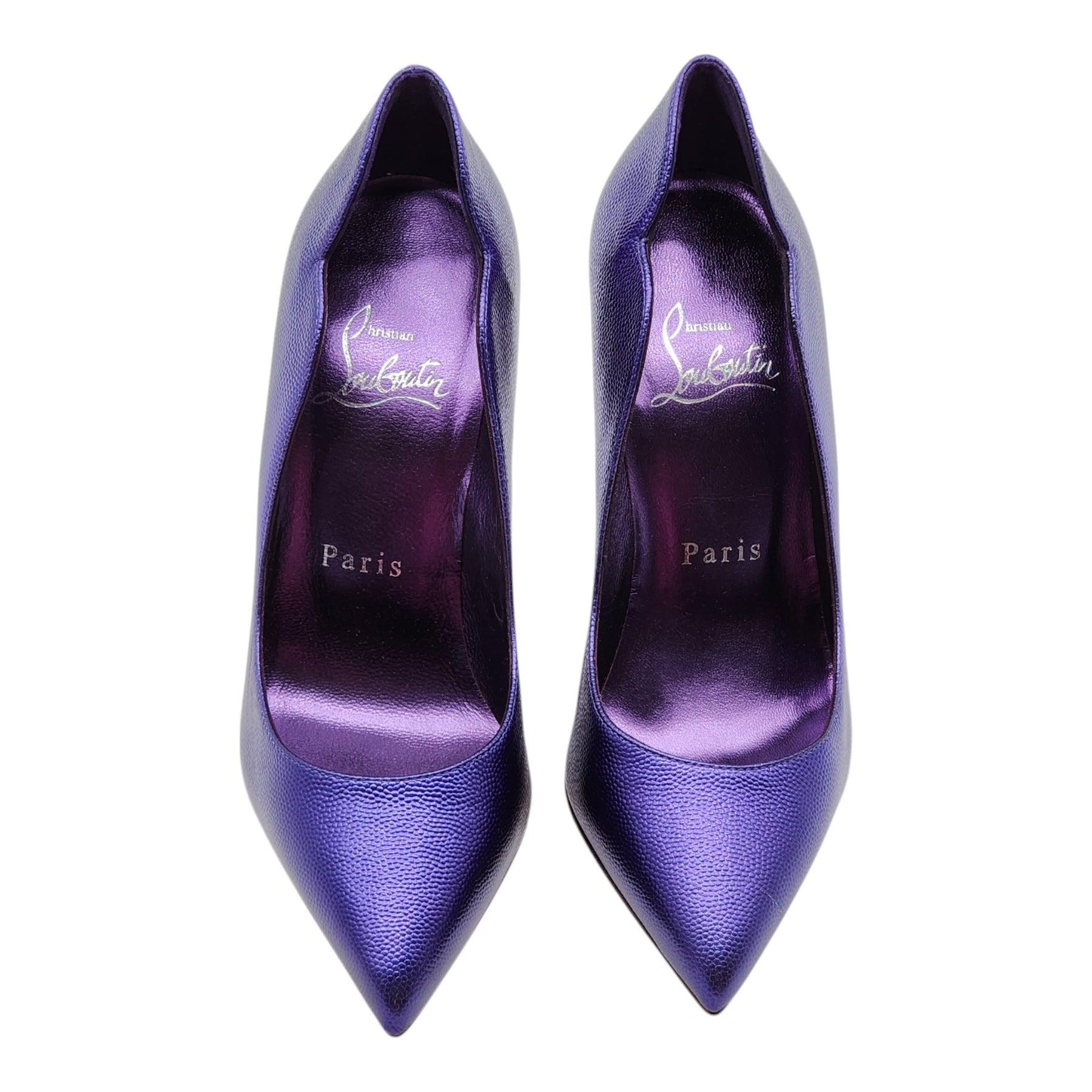 Christian Louboutin Hot Chick Pumps in purple leather.

Notes from Louboutin: The Hot Chick pump is an iconic Maison Christian Louboutin design with a low-cut vamp, a pointed toe and V-shaped notches under the ankle. Set on a 100 mm heel, the
