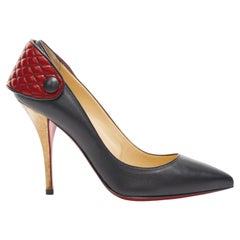 CHRISTIAN LOUBOUTIN Huguetta 100 nera con cinturino trapuntato e tacco d'oro EU36