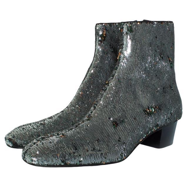 Christian Louboutin, botas Huston glitter en plata en venta