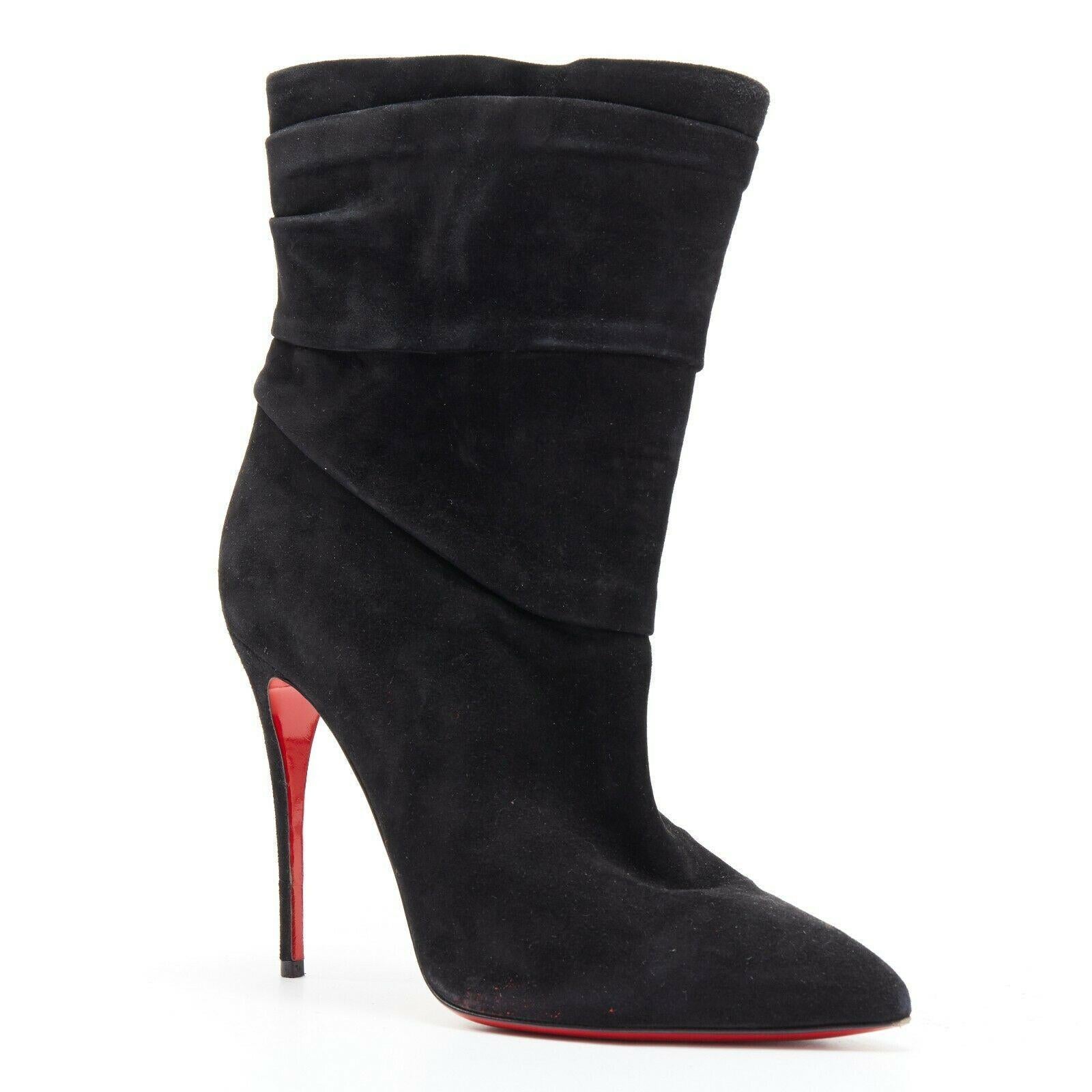 CHRISTIAN LOUBOUTIN Ishtar 100 black suede pointed toe ruched heel boot EU39

CHRISTIAN LOUBOUTIN
Ishtar 100. Black suede leather. Ruched detail at shaft opening. Pointed toe. Tonal stitching. Stiletto heel. Wide opening. Padded tan leather lining.