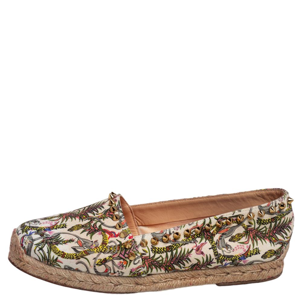 Christian Louboutin brings you these super-stylish espadrilles that have been crafted from printed canvas and detailed with spike embellishments. Braided midsoles and canvas insoles complete this must-have pair!

Includes: Original Dustbag