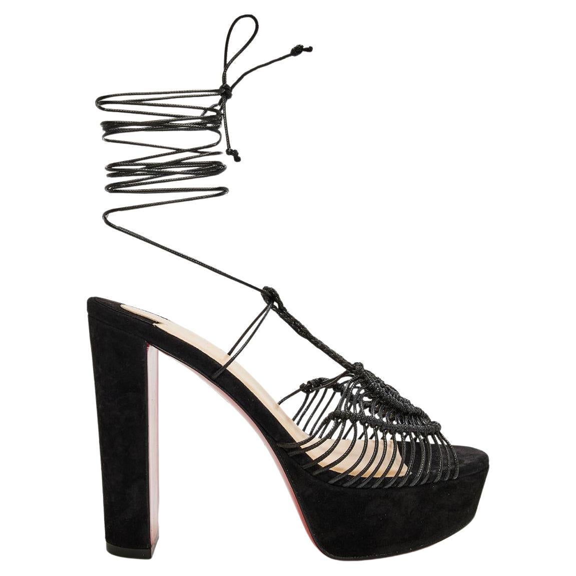 Christian Louboutin's 'Janis in Heels' alta 130 sandals have been made in Italy from hand-woven macramé cotton. The sturdy platform & block heels mean you can wear them comfortably all day and reveal a flash of the iconic red soles as you walk.