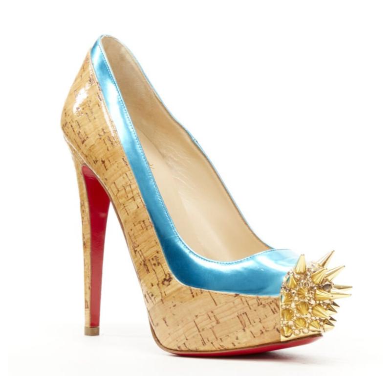CHRISTIAN LOUBOUTIN laqué marron liège bleu strass plateforme à picots EU36.5
Référence : TGAS/C01056
Marque : Christian Louboutin
MATERIAL : Liège, cuir
Couleur : marron, bleu
Motif : Solide
Doublure :  Cuir
Détails supplémentaires : Liège laqué et