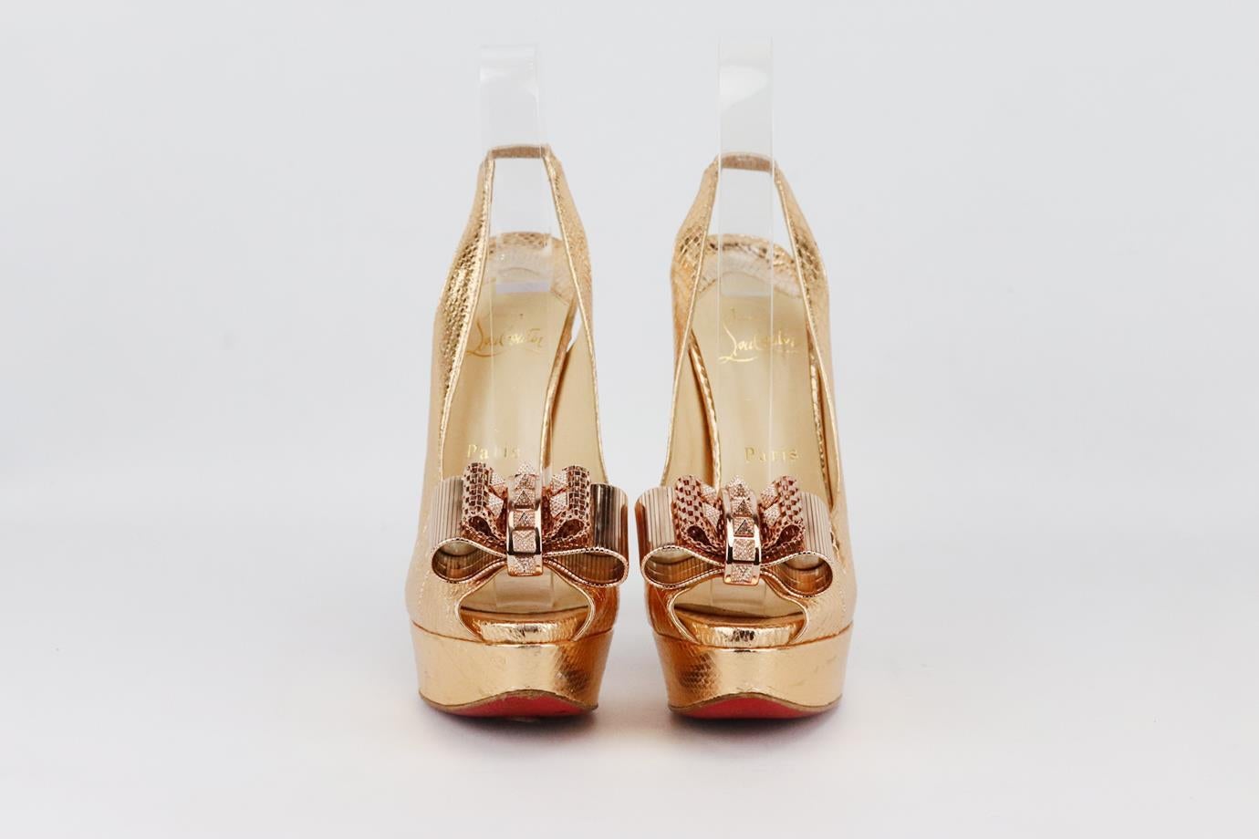 Christian Louboutin Metallic Lady Clou spiked snake effect slingback platform sandals. Made from rose-gold snake-effect leather with spiked bow and slingback sillhouette. Rose-gold. Slips on. Comes with box and dustbag. Size: EU 38 (UK 5, US 8).