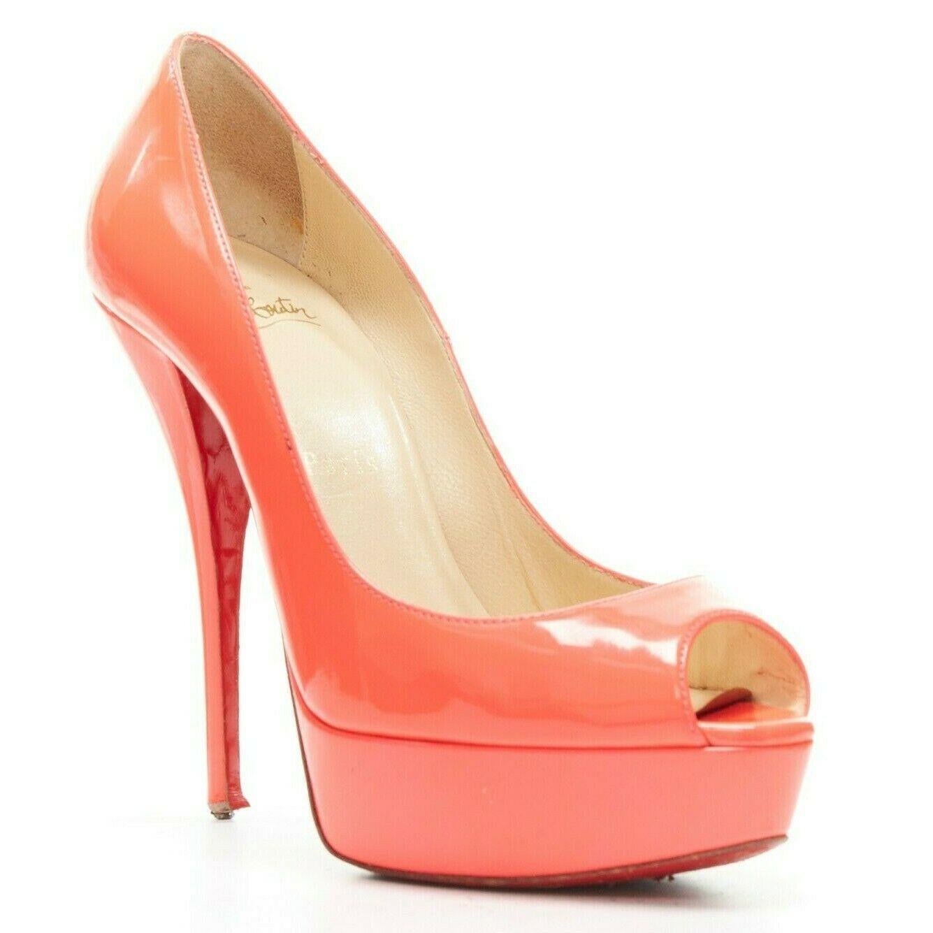 CHRISTIAN LOUBOUTIN Lady Peep 130 shocking pink patent peep platform pump EU36 
Reference: TGAS/A03402 
Brand: Christian Louboutin 
Designer: Christian Louboutin 
Model: Lady Peep 130 
Material: Patent Leather 
Color: Pink 
Pattern: Solid 
Extra