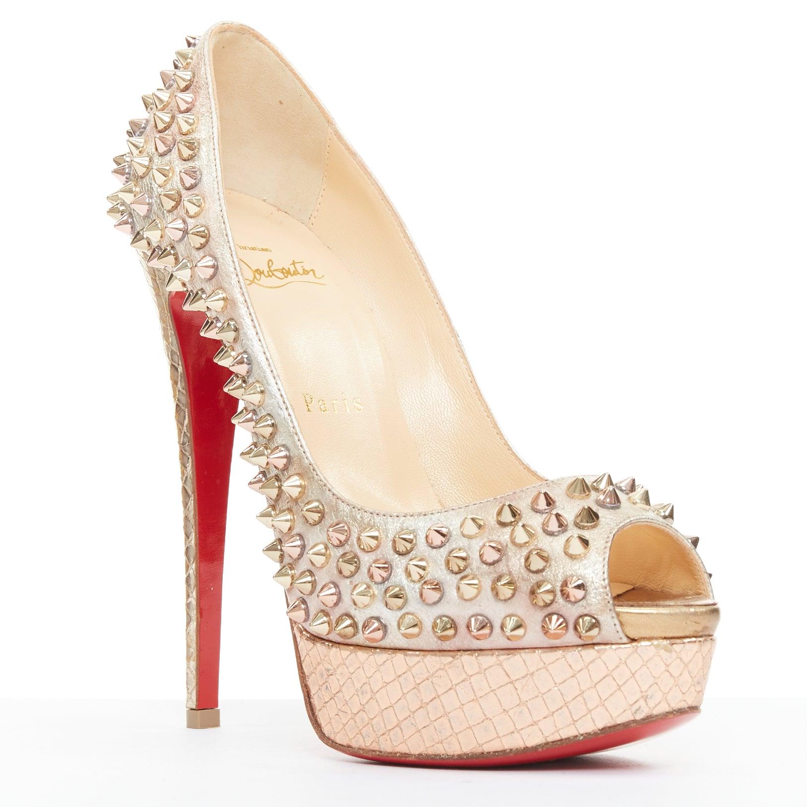 CHRISTIAN LOUBOUTIN Lady Peep 150 zapato peep toe de plataforma con tachuelas metálicas doradas EU38
Referencia: TGAS/F00078
Marca: Christian Louboutin
Model No: Lady Peep 150
Material: Piel
Color: Dorado
Patrón: Estampado animal
Cierre: Slip
