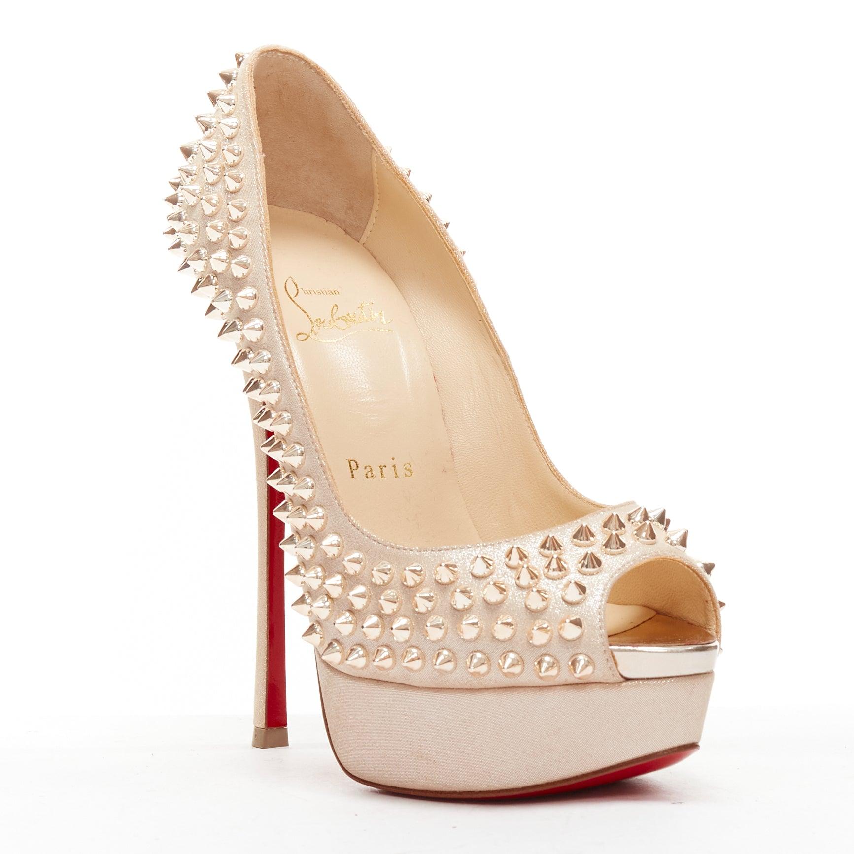 CHRISTIAN LOUBOUTIN Lady Peep metallic gold spike platform peep toe EU36.5
Reference: TGAS/D00524
Brand: Christian Louboutin
Model: Lady Peep
Material: Leather
Color: Gold
Pattern: Solid
Closure: Slip On
Lining: Nude Leather
Made in: