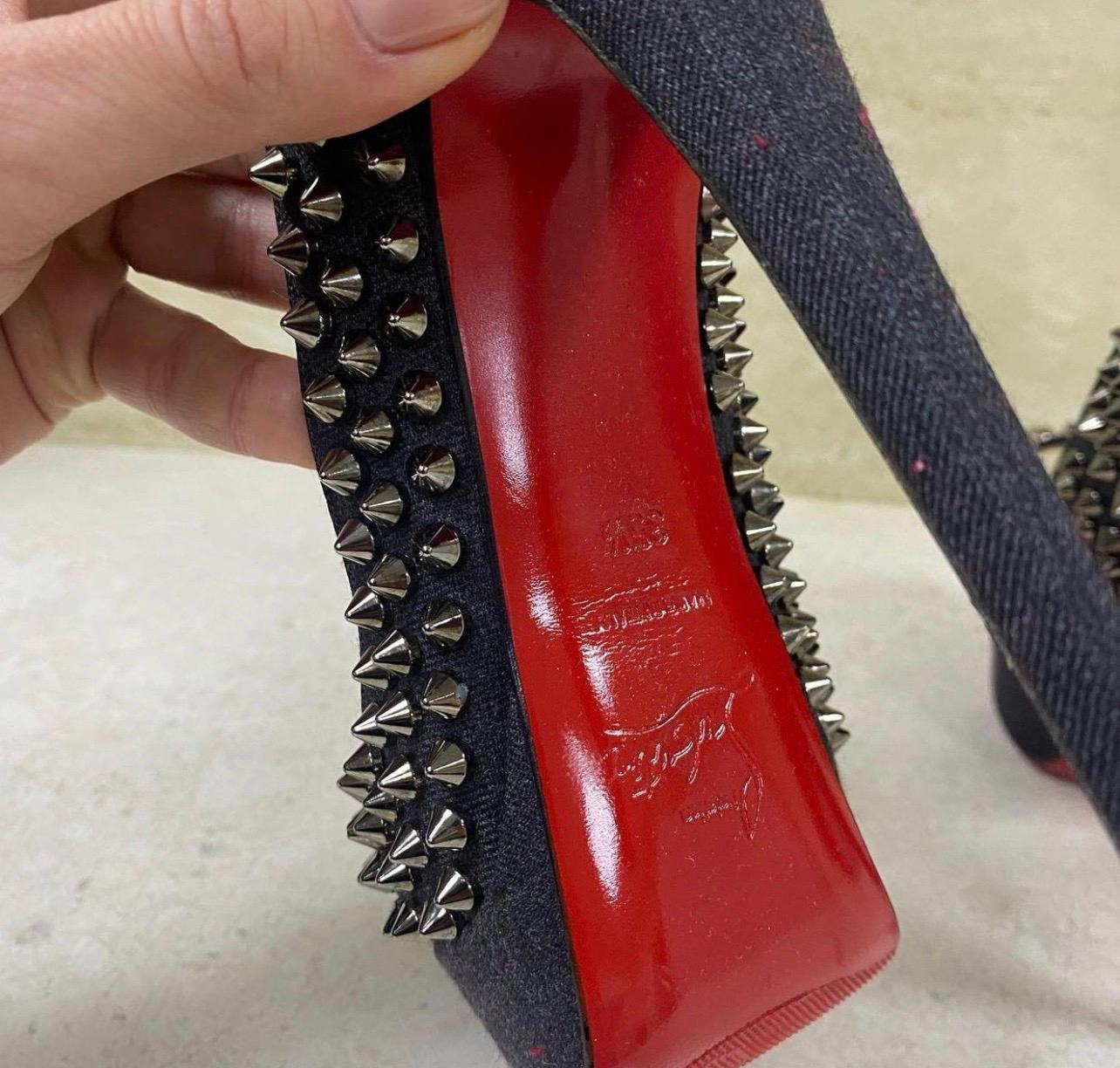 christian louboutin black heels with spikes