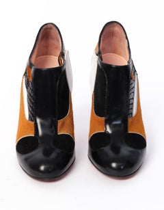 Christian Louboutin Leather and Calf Hair Ankle Booties (37.5 EU)