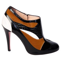 Christian Louboutin Leather and Calf Hair Ankle Booties (37.5 EU)