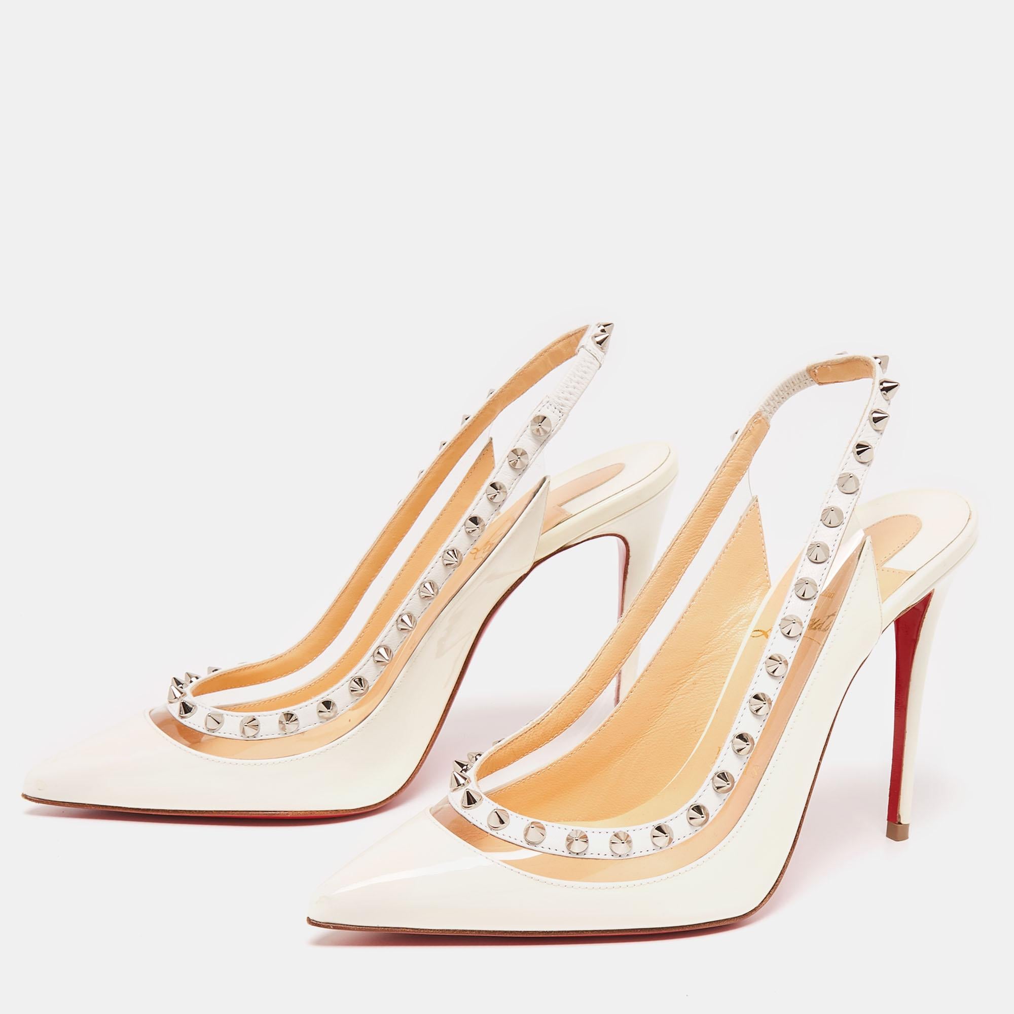 Rock these Christian Louboutin spike pumps at the next party! They have been crafted from patent leather and PVC into a slingback design and come with comfortable insoles. Pair the chic 10 cm heels with leather jackets for an edgy appeal.