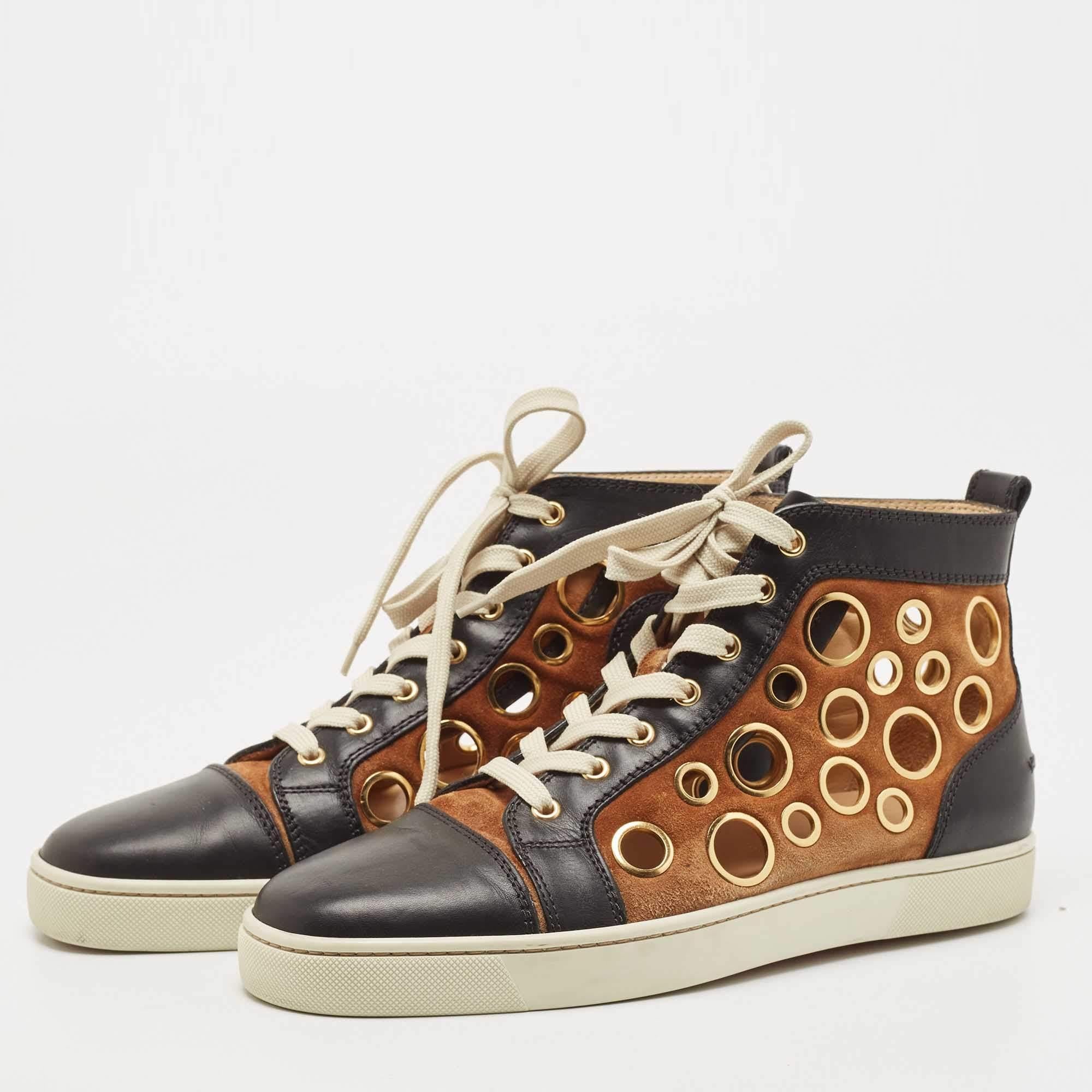 Fall in love with casual wear every time you step out in these sneakers from Christian Louboutin. They've been crafted from leather and suede and styled as a high top with an exterior breathtakingly lined with bubble cutouts. The sneakers carry